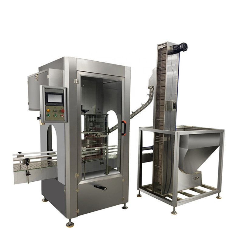 Машина для закривання пляшок з однією головою